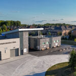Aerial view of the Memorial Park Skating Trail building in Stouffville, highlighting the modern Gray ACM Commercial Project.