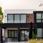 Rear view of a North York home featuring ACM and WPC exterior materials.
