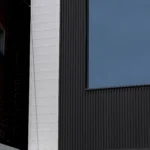 Vertical view of Toronto PVC & WPC Shadow Gap siding installation on a residential home.