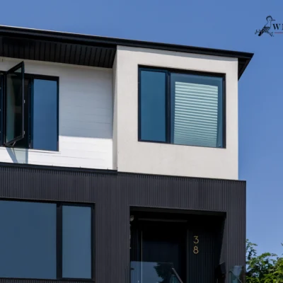 Toronto PVC & WPC Shadow Gap siding on a modern residential home exterior.