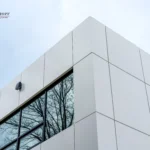 Modern white ACM panel building with reflective windows in North York, Ontario