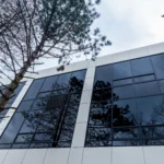 White ACM facade with reflective windows in North York, Ontario