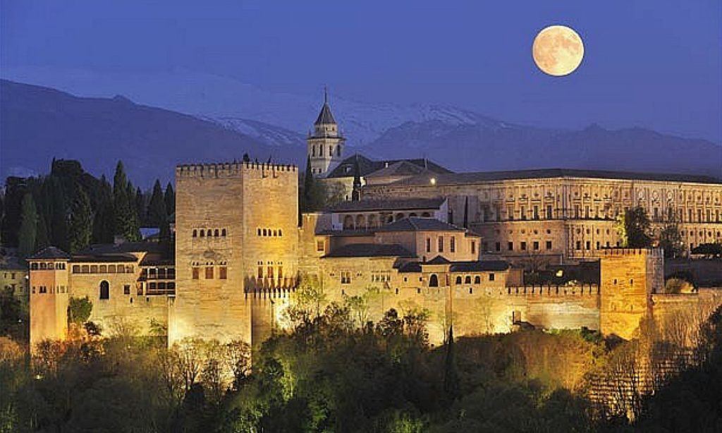 Alhambra palace in Granada, Spain, known for geometric façades, detailed ornamentation, and Islamic architectural craftsmanship